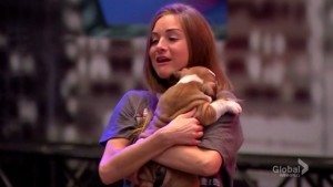 Big Brother Canada 4 - Nikki Grahame cuddles a puppy